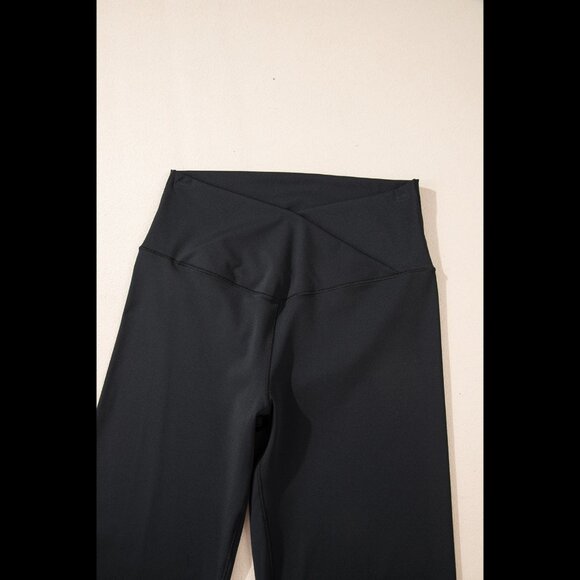 High-waisted crossover flared black leggings - Picture 8 of 10